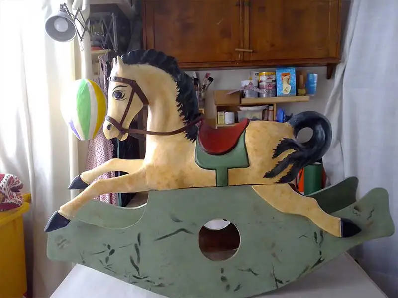 restauro giocattoli in legno - cavalli a dondolo - giochi per bambini restaurati - Mangiafuoco